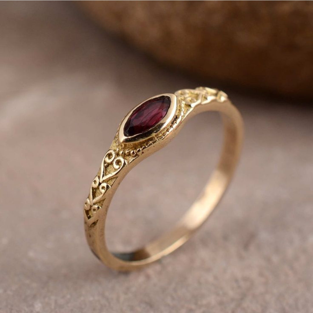 Vintage gold ring with red crystal