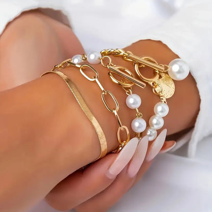 Chic 4-Piece Gold Bracelet Set – Snake, Pearls, and Links