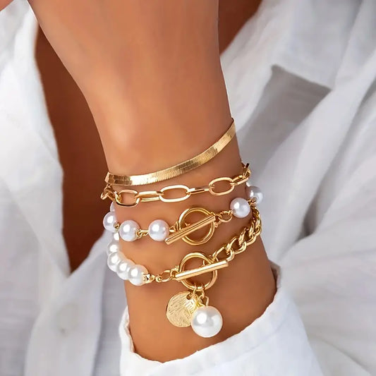 Chic 4-Piece Gold Bracelet Set – Snake, Pearls, and Links