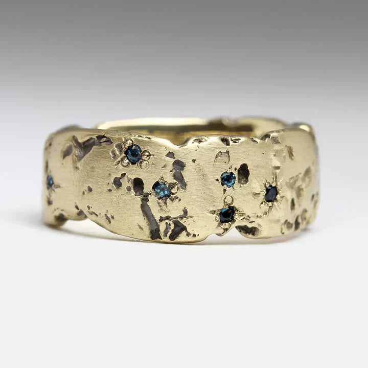 Vintage forged gold ring with blue mosaic crystal