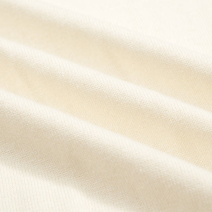 Vintage Knitted Polo for Men from the 1970s – Retro Cream with Green Striped Collar and Edges