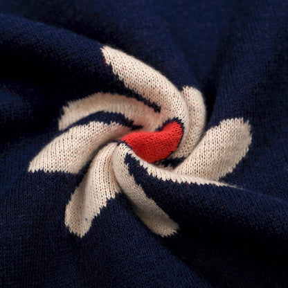 1970s Retro Knitted Polo for Men – Vintage Navy with Daisy Pattern