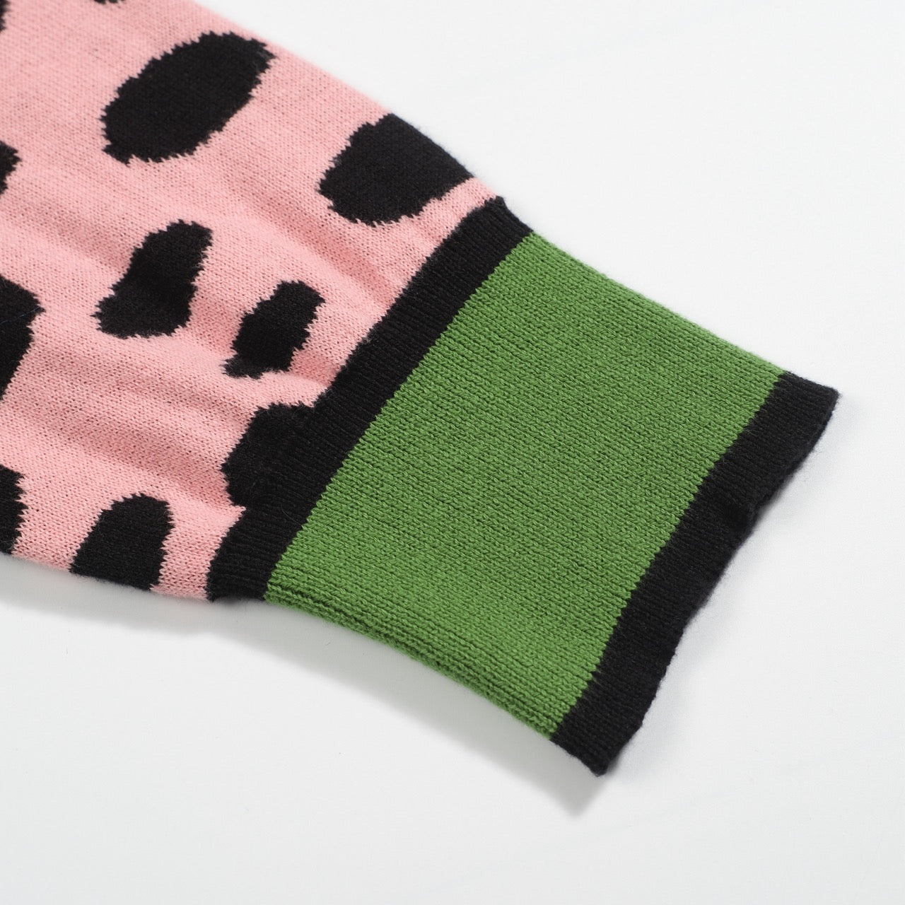 Retro Knit Jumper for Men – Vintage Green Jumper with Graphic Pink Cheetah Sleeves