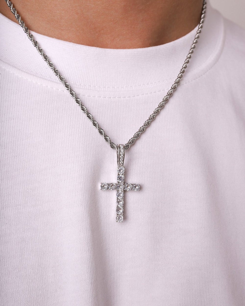 CROSSED PIECE PENDANT.