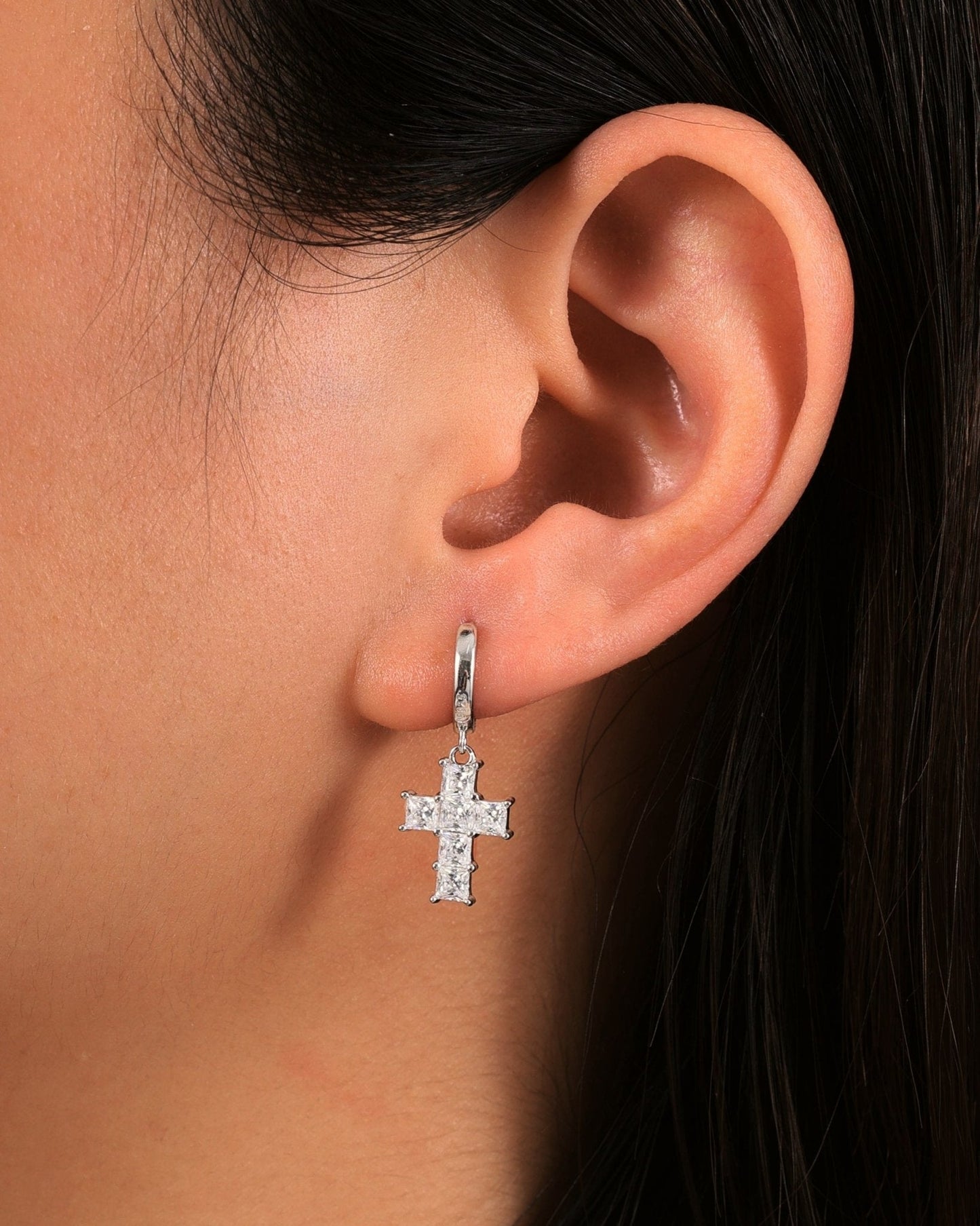 CROSS ARROW EARRINGS.