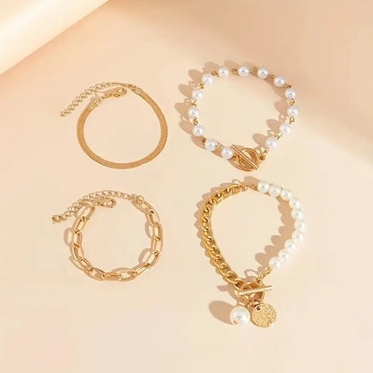 Chic 4-Piece Gold Bracelet Set – Snake, Pearls, and Links