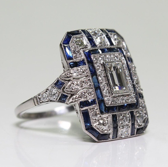 Vintage polished silver ring with blue zircon