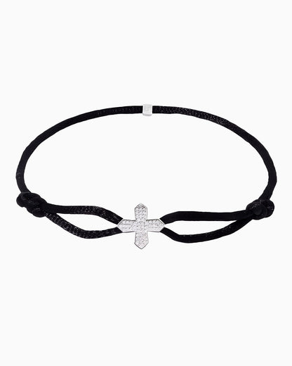 MOISSANITE CROSS CORD BRACELET.