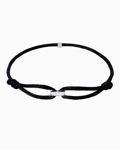 CORD BRACELET WITH INFINITY MOISSANITE RING.