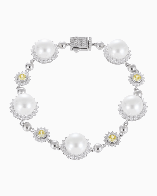 MOISSANITE AND SUN BEAD BRACELET.