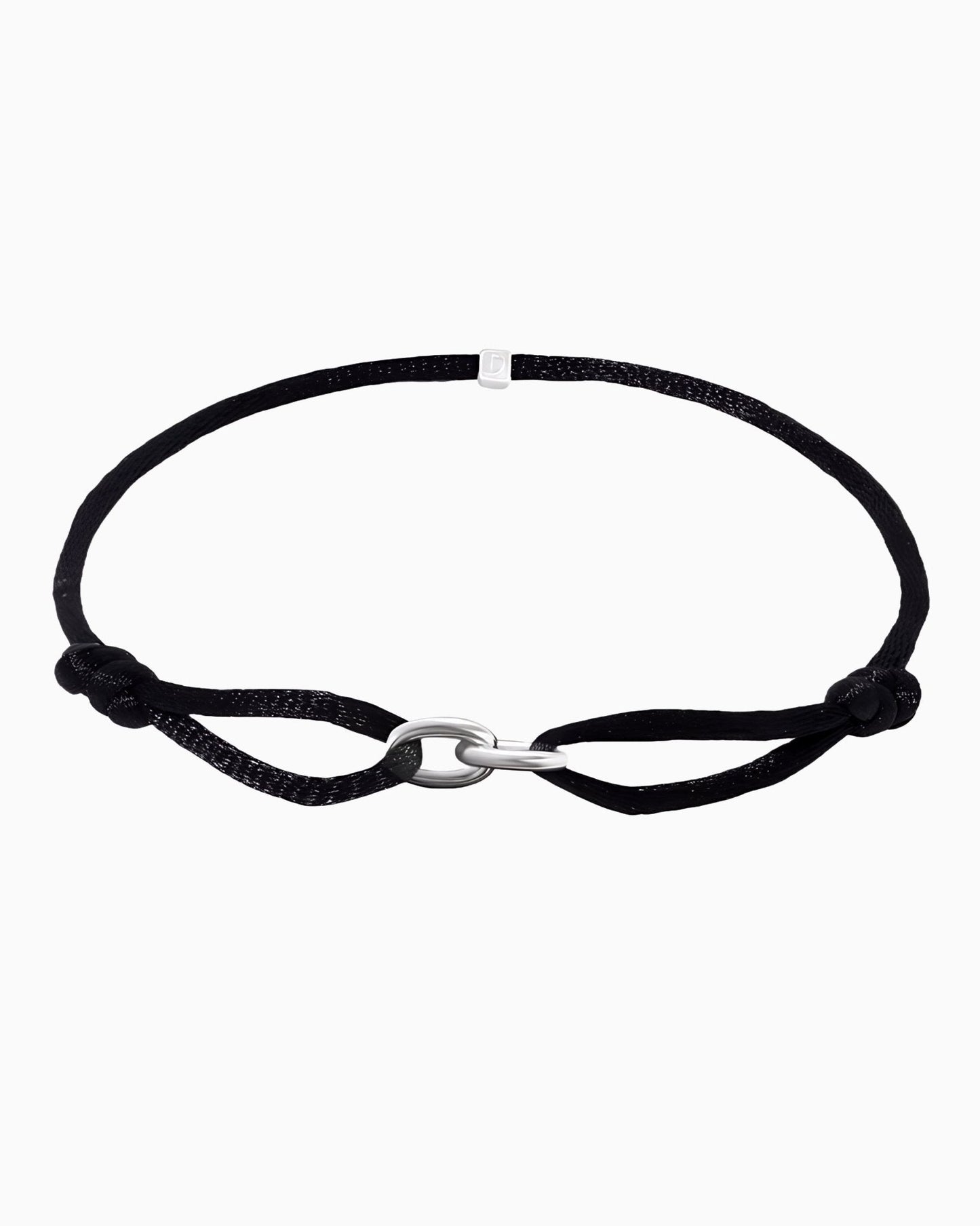 CORD BRACELET WITH OVAL LINK.