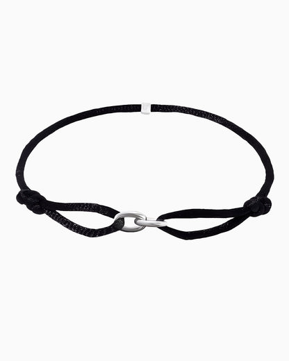 CORD BRACELET WITH OVAL LINK.