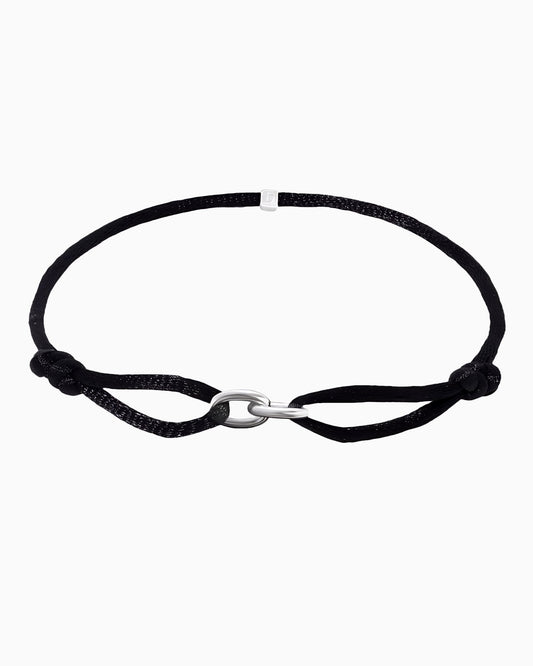 CORD BRACELET WITH OVAL LINK.