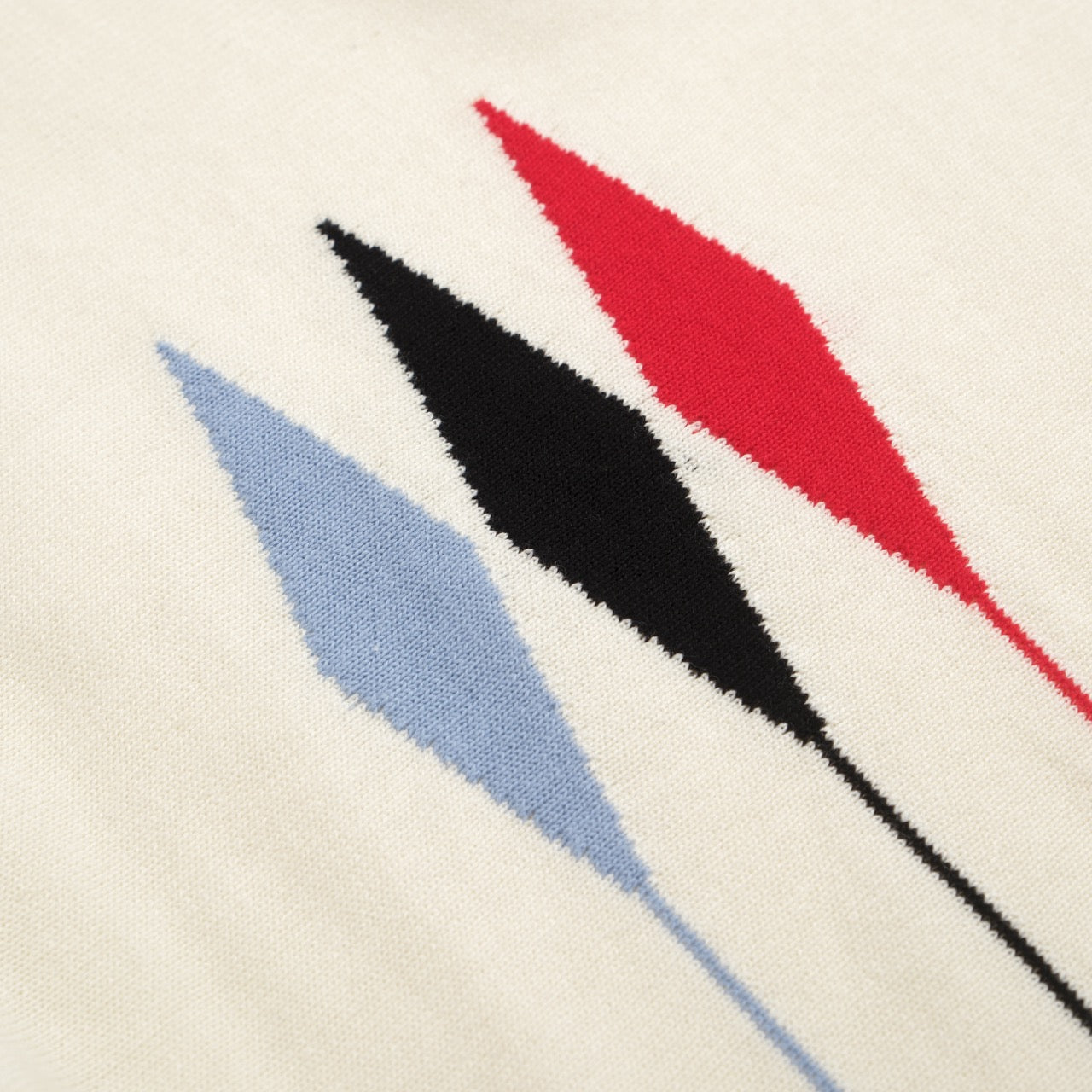 1970s Vintage Knit Polo for Men – Retro Cream with Red, Black & Blue Arrow Graphic