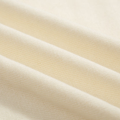 1970s Vintage Knit Polo for Men – Retro Cream with Red, Black & Blue Arrow Graphic