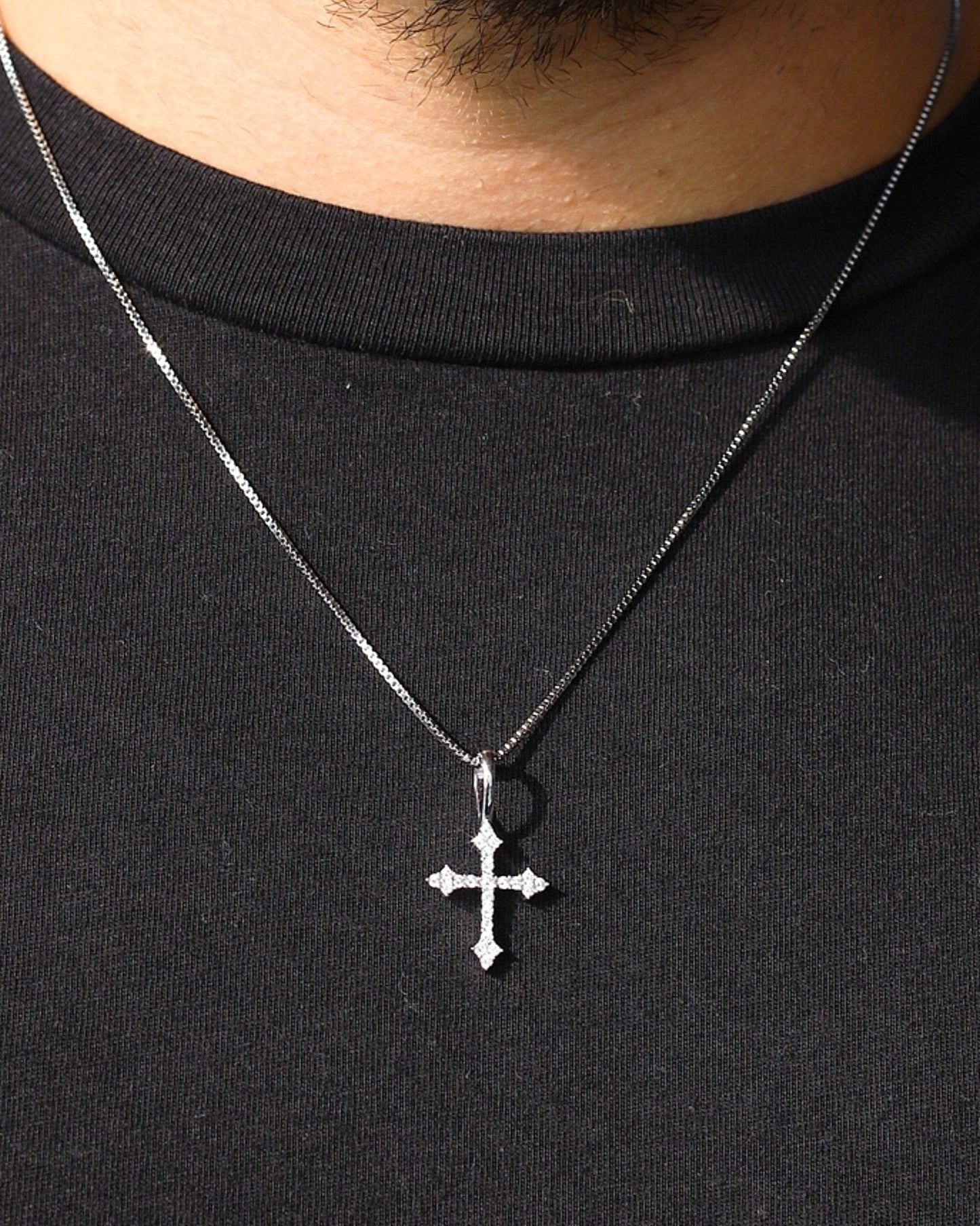 THE CROSS PENDANT.