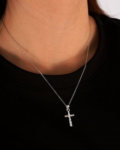WELDED CROSS PENDANT.